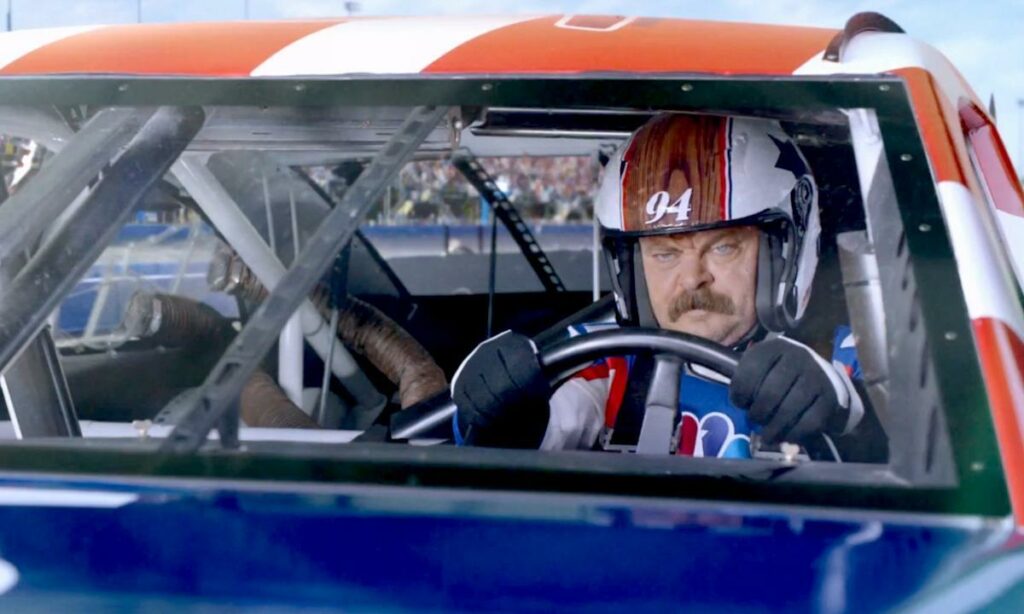 En bilsportbil med en man som kör den. (AI text)