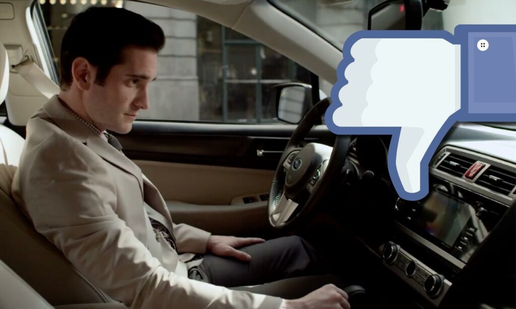 En man sitter i en bil med en Facebook-gilla-knapp. (AI text)