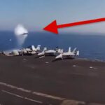 Ett stridsflygplan flyger över havet. (AI text)