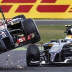 Pastor Maldonado kör ihop med Esteban Gutierrez under Silverstones GP 2014. World Copyright: Charles Coates/LAT Photographic.