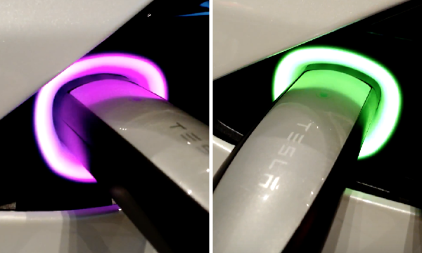 En bil med grönt och lila ljus på instrumentbrädan (AI text)