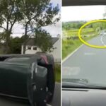 En bil ligger upp och ner på en landsväg. (AI text)