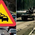 En bil kör nerför en highway med en skylt som säger'stop'. (AI text)