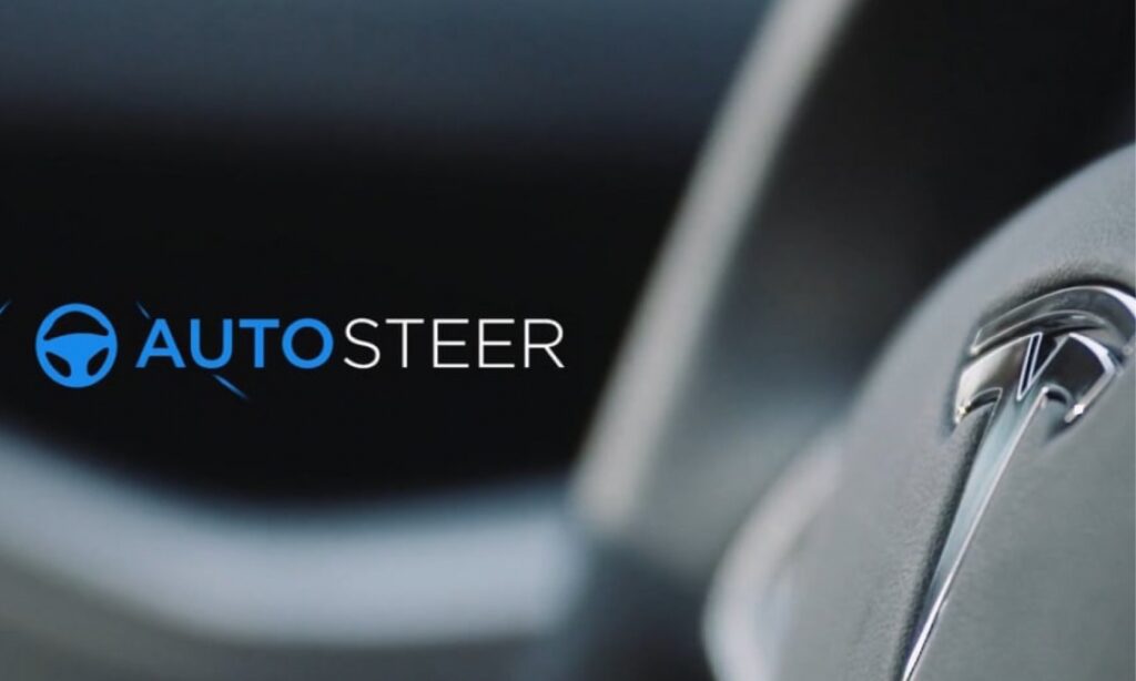 Tesla-logotypen på ratten (AI text)