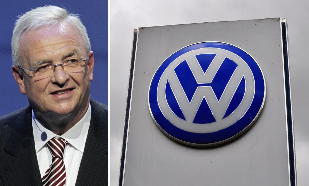 En Volkswagen-logga och en person står bredvid den. (AI text)