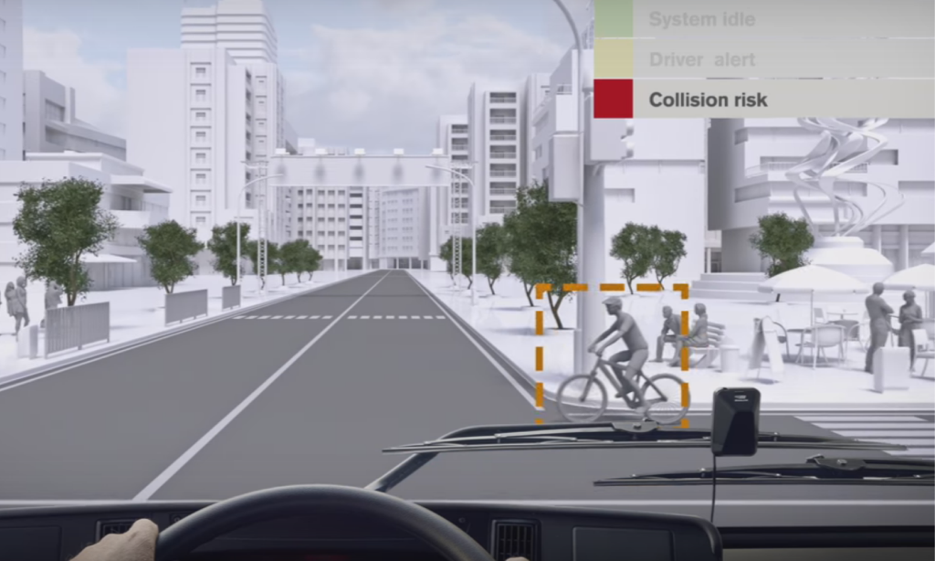 En bil kör genom en stadsgata. (AI text)