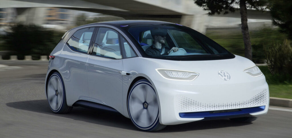 En vit Volkswagen ID kör på en väg. (AI text)