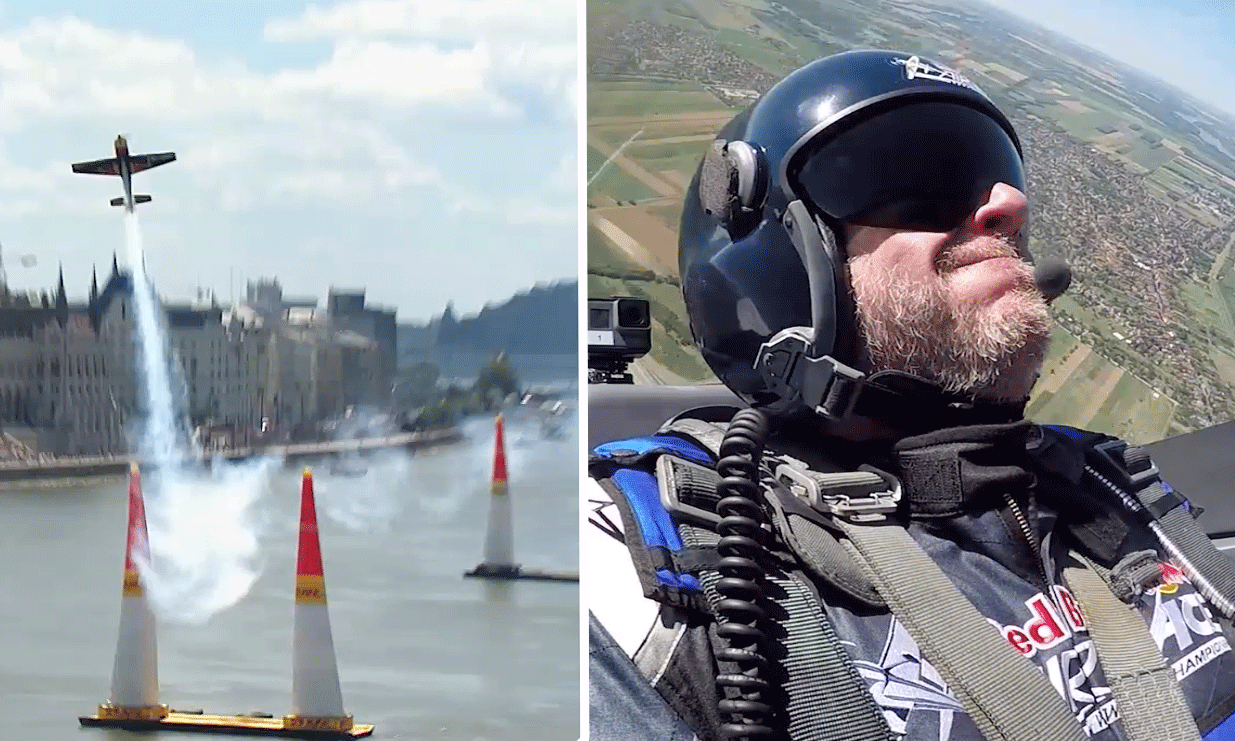 Person flyger en röd Bull Air Racer över Donau. (AI text)