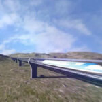 En tåg rullar längs spåret. (AI text)