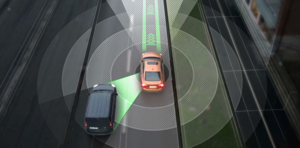 En bil kör på en stadsgata. (AI text)