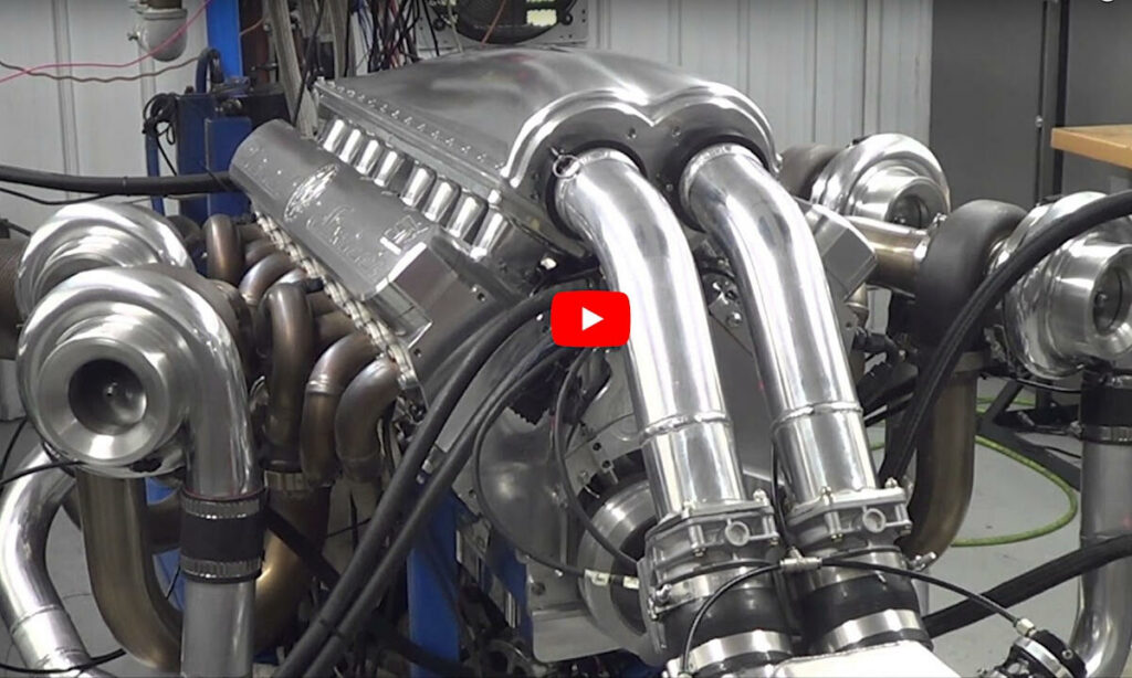 En bilmotor byggs i en garage. (AI text)