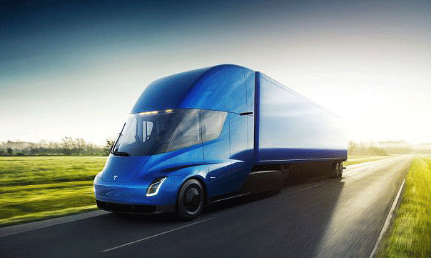 En Tesla-lastbil kör på en landsväg. (AI text)