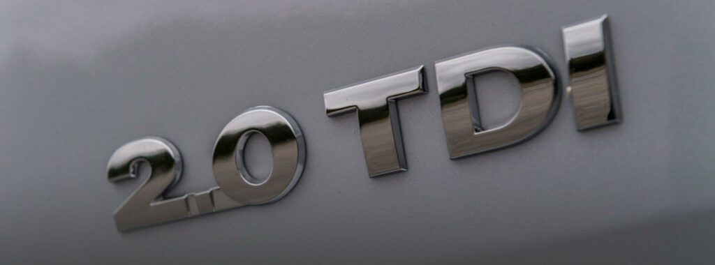 En TDI-logga på en bil (AI text)