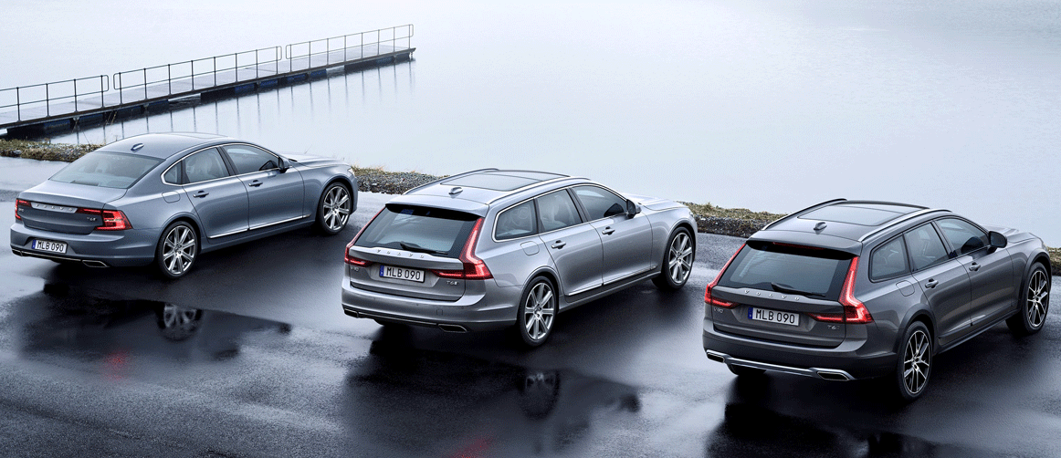 Den nya Volvo XC90 parkerad vid en pier. (AI text)
