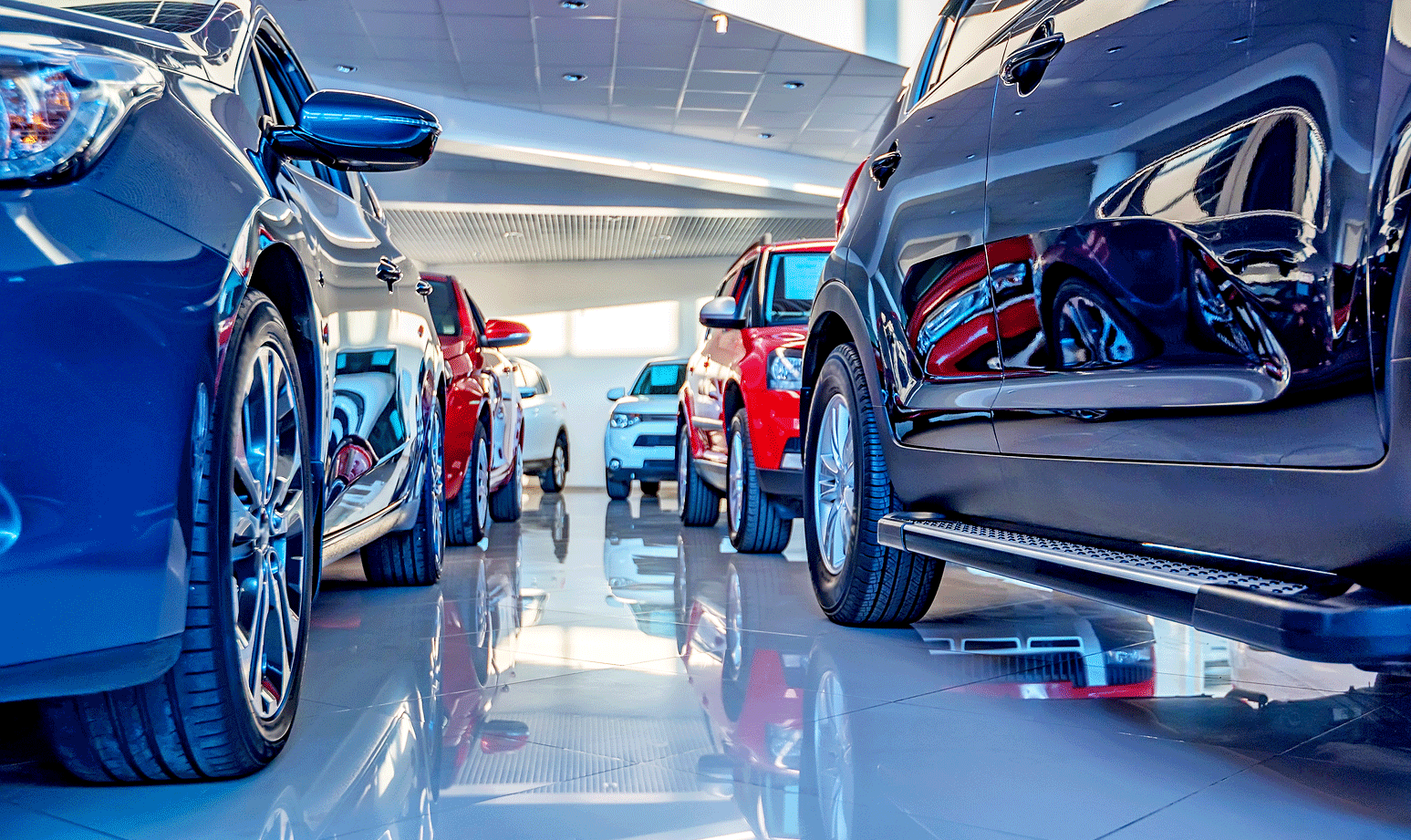 En bilhandel med många bilar. (AI text)