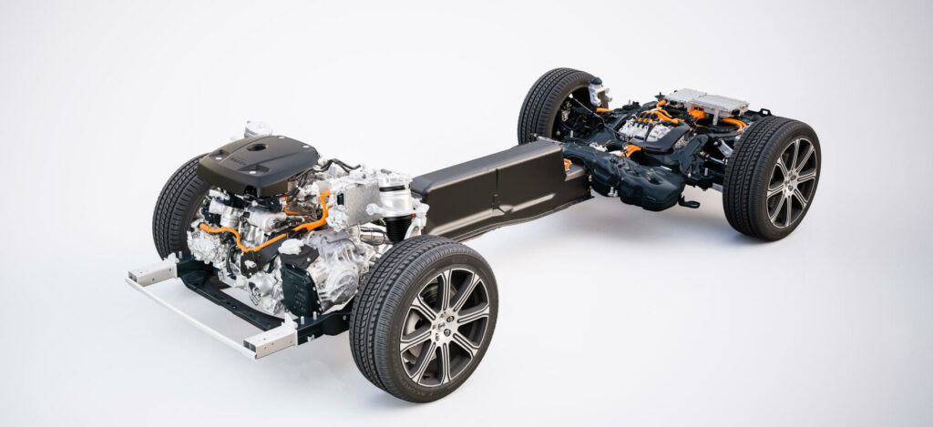 En bil med motor och hjul på ett vitt bakgrund. (AI text)