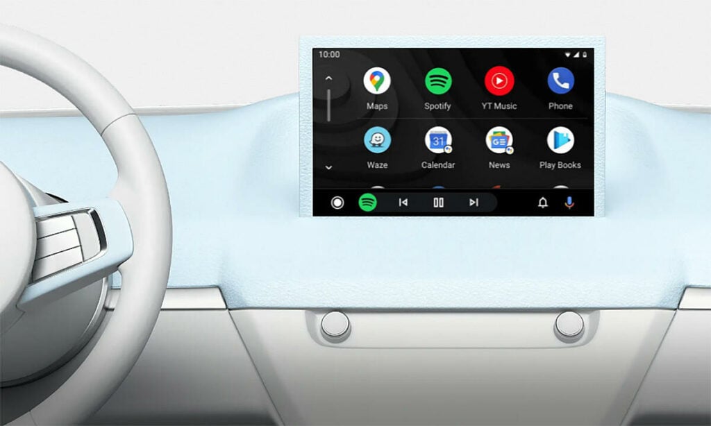 en bilinteriör med ratt och instrumentbräda (AI text)