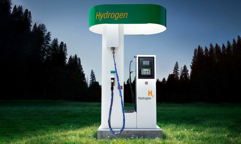 En bensinstation med ett grönt skylte (AI text)