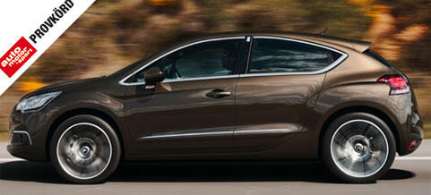 En brun bil kör ner på vägen. (AI text)