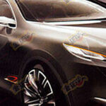 En svart bil med ett svart grille. (AI text)