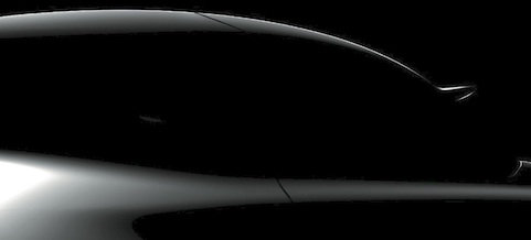 En svartvit bild av en bil. (AI text)