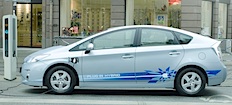 En laddare som laddar en Toyota Prius. (AI text)