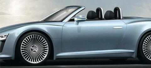 En blå sportbil som cabriolet visas i bilden. (AI text)