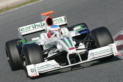 en race car som kör nedför en bana (AI text)