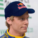 Formel 1-förare från Red Bull med hatt (AI text)