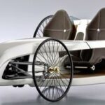 En vit bil med hjul på den. (AI text)