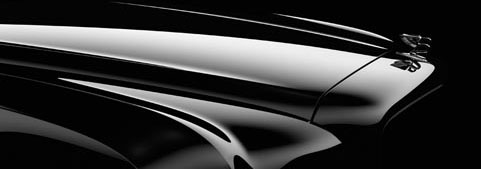 En svartvit foto av en bil. (AI text)