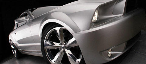 En bil i en mörk rum. (AI text)