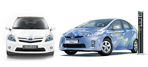 En Toyota Prius och en Toyota Prius HV (AI text)