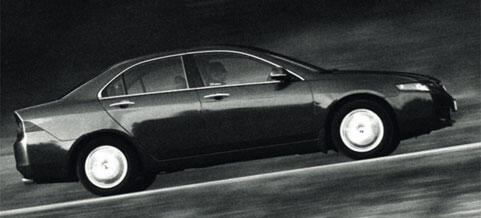 En svartvit bild av en bil som kör nerför en väg. (AI text)