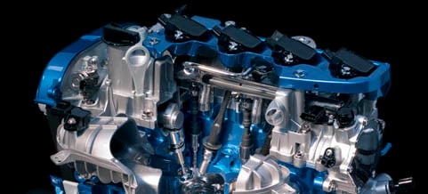 En bilmotor med en blå motor. (AI text)