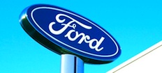 En Ford-logotyp på en stolpe (AI text)