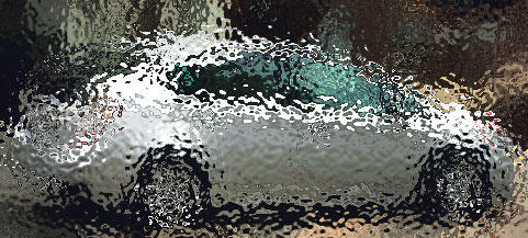 En bil körer nedför en gata på en regnig dag. (AI text)