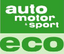 En bil med orden Auto Motor & Sport på den. (AI text)
