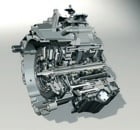 Bildens innehåll är en bilmotor. (AI text)