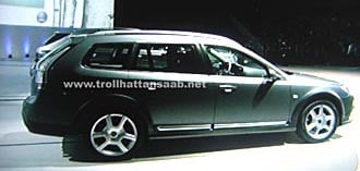 En bil är parkerad på en scen. (AI text)