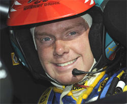 en racerbilförare i en rallybil (AI text)