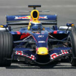 Red Bull-racingbil kör på en bana. (AI text)