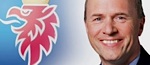 En man i kostym och slips leder vänligt. (AI text)