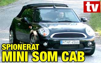 En svart Mini Cooper S cabriolet (AI text)