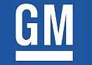 GM-logotypen på en blå bakgrund (AI text)