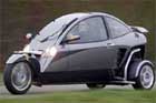 En liten bil med en motor. (AI text)