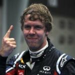 Red Bull-racingföraren firar segern efter loppet (AI text)