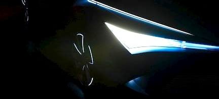 En bil med tänd hastighetdämpare i mörkret. (AI text)