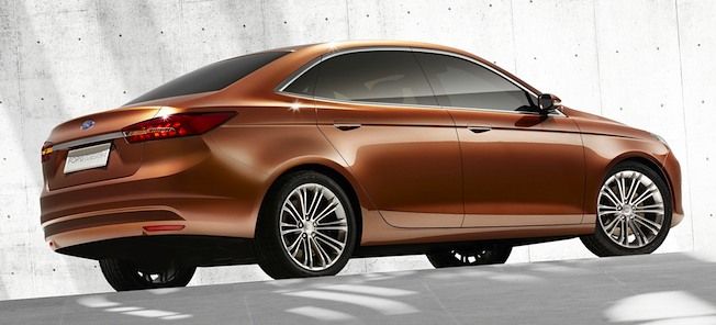 En bil står parkerad framför en betongvägg. (AI text)