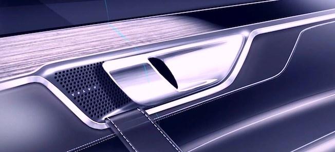 En närbild på bilens dörrhandtag (AI text)